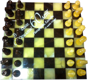 Лазерная гравировка на мраморной шахматной доске.